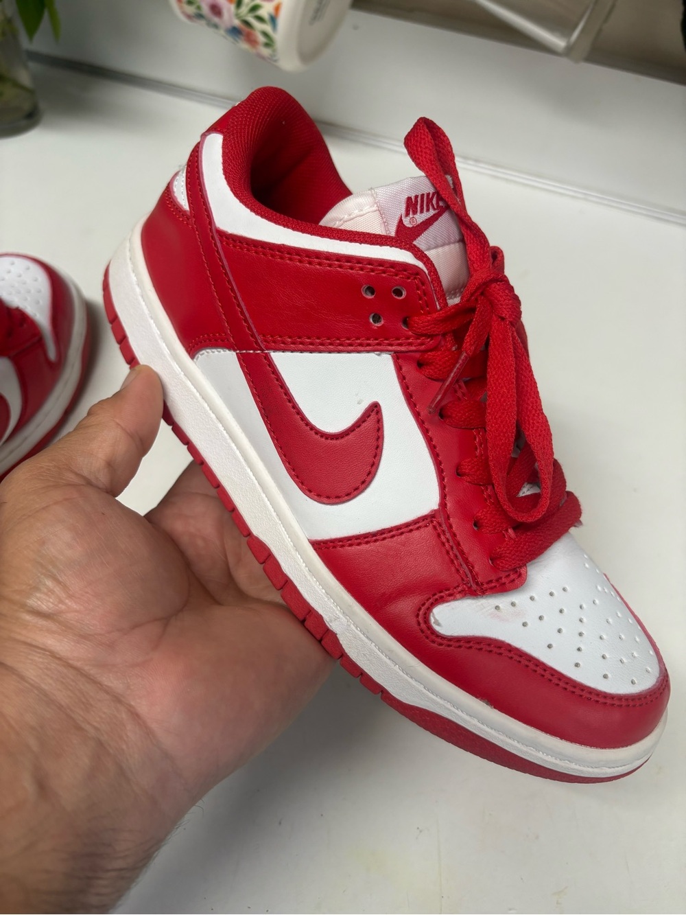 Excellent condition size 7 Nike Kids Red and White Low-Top Skate Sneaker